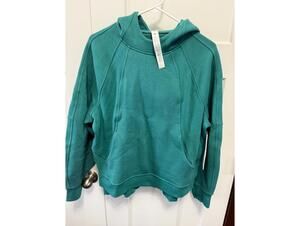 Lululemon scuba oversized in teal with side slits and hood size XS/S NWT